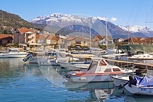 Fishing boats in harbor. Montenegro. View of Marina Kalimanj in Tivat city in winter