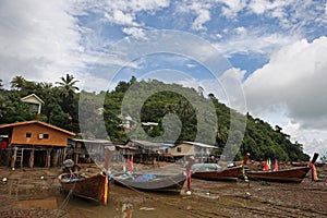 Fishing boats and houses on stilts