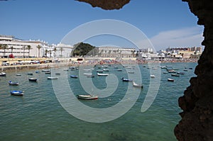Fishing boats in La Caleta beach and old seaside resort, Cdiz, Andalusia region, Spain, Europe photo
