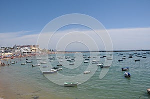 Fishing boats in La Caleta beach and old seaside resort, Cdiz, Andalusia region, Spain, Europe photo
