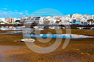 Fishing boats at low tide on the Atlantic coast of Lanzarote