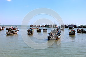 Fishing boats moored by the beach