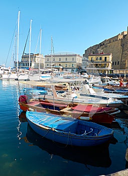 Fishing boats moored in Borgo Marinari harbor. Naples, Italy.