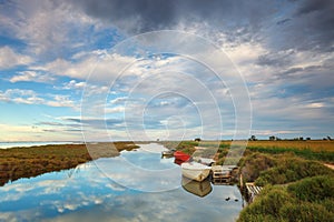 Fishing boats in a natural harbor in Fangar bay, Ebro Delta, Tarragona