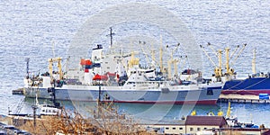 Fishing boats near the pier on Kamchatka peninsula