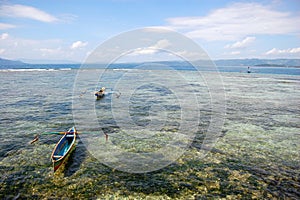 Fishing boats at ocean bay near coast Indonesia