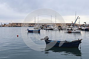 Fishing boats in old harbor of Bari, Puglia, Italy