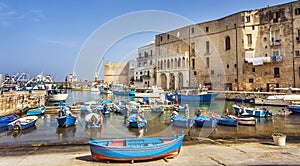 Fishing boats at the old port of Porto Vecchio in Monopoli Puglia