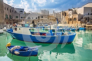 Fishing boats at the old port of Porto Vecchio in Monopoli Puglia photo