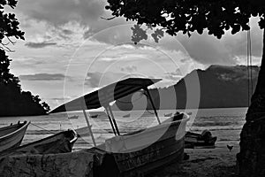 Fishing boats or pirogues on the seashore of the Maracas Bay Fishing Village, Trinidad