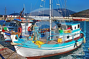 Fishing boats in port of kefalonia photo