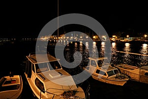 Fishing boats in the port at night