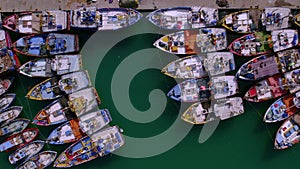 Fishing boats in the port of Sri Lanka. View of the boats directly above Fishermen village in Sri Lanka in Mirissa.