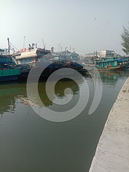 fishing boats in the port of Tegal, Central Java photo