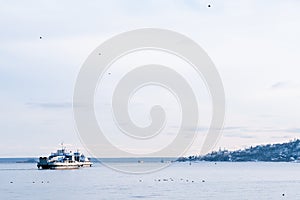 Fishing boats in the sea. ferry on the winter sea.