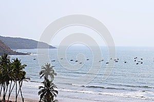 Fishing Boats in Sea at Konkan Coast in India photo