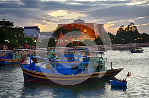 Fishing boats and ships in the town port in Phan Thiet, Binh Thuan, Vietnam