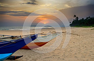 Fishing boats on the shore of the ocean