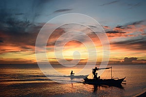 Fishing boats silhouette at sunset. White beach. Boracay. Aklan. Western Visayas. Philippines