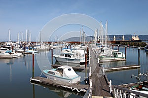 Fishing boats & small yachts in a marina.