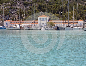 Fishing boats stand in the marina of the resort town of Methana in the Peloponnese in Greece