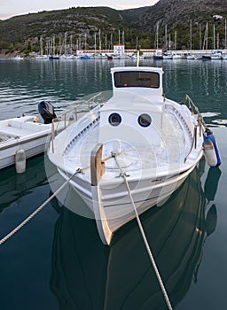 Fishing boats stand in the marina of the resort town of Methana in the Peloponnese in Greece