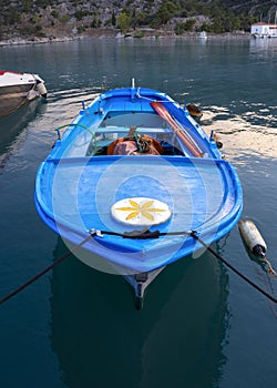 Fishing boats stand in the marina of the resort town of Methana in the Peloponnese in Greece