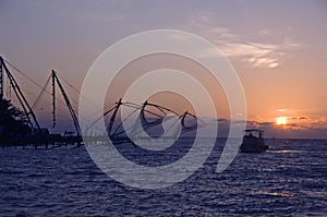 Fishing boats at sunset