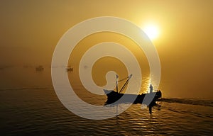 Fishing boats, sunset