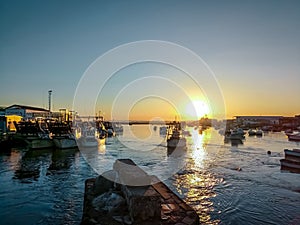 Fishing boats at sunset in Isla Cristina harbour, Huelva, province of Andalusia, Spain