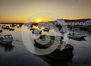 Fishing boats at sunset in Isla Cristina harbour, Huelva, province of Andalusia, Spain