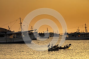 Fishing boats at sunset in Margarita Island. Venezuela photo
