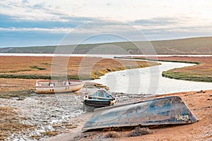 Fishing boats at sunset in the Olifants River estuary