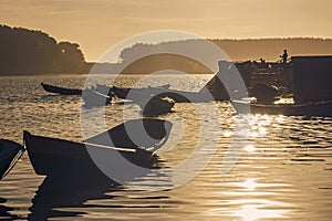 Fishing boats at sunset in Puerto Saavedra, Chile. photo