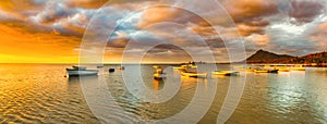 Fishing boats at sunset time. Amazing landscape. Panorama