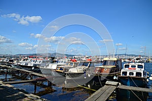 Fishing boats tied up at the wharf in Buyukada island