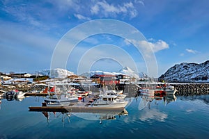 Fishing boats and yachts on pier in Norway