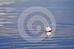 Fishing bobber scene photo