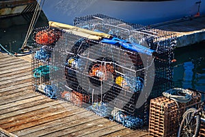 Fishing cages on wooden jetty