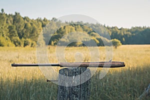Fishing fly on the handle of the rod. Fishing method tenkara