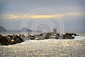 Fishing fron the breakwater