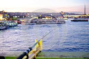 Fishing on Galata Bridge, sunset view Istanbul