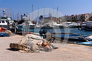 Fishing gear, on the edge of a dock, in the port of Cabo de Palos, in Murcia, Spain,