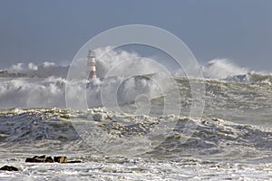 Fishing harbor under heavy storm