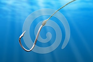 Fishing hook in the sea photo