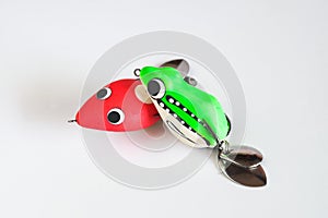 Fishing hook with soft plastic in the shape of a frog
