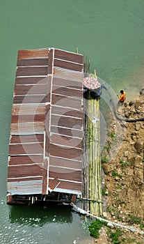 Fishing on the house boat in quiet Chongalia River