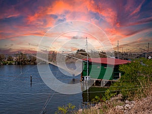 Fishing hut with fishing net in the Comacchio lagoon in italy