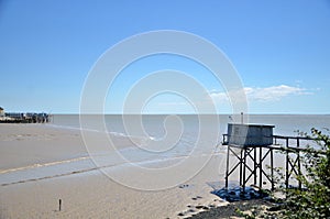 Fishing hut at low tide