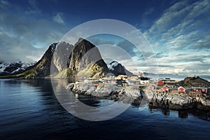 Fishing hut at spring sunset - Reine, Lofoten islands, Norway